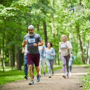 Prioritizing Health and Aging in Your Exercise Routine | Diverse group of people of all ages practicing mindful movement in nature, emphasizing health and longevity through exercise.