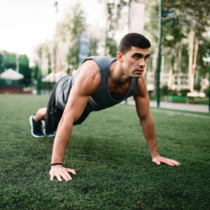 Redefining Fitness Embracing Outdoor and At-Home Workouts | Person exercising outdoors in a peaceful setting, showing alternative ways to stay fit without going to the gym.