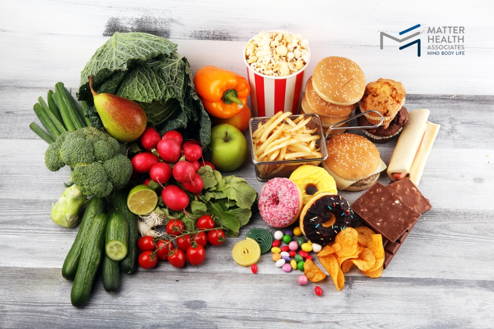 Whole Foods vs. Processed Foods_ Fueling Your Body the Right Way | Contrast between nutrient-dense whole foods and processed junk food, illustrating the difference in energy sources and nutritional value.
