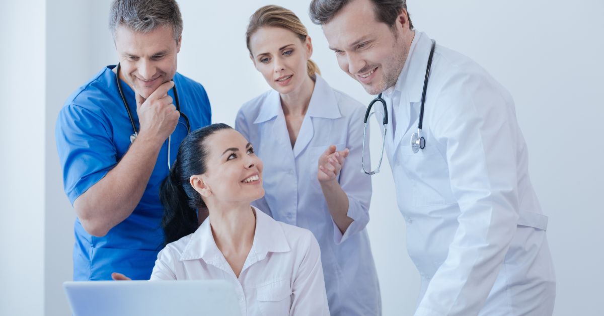 A group of health professional consultants working together to support client wellness.